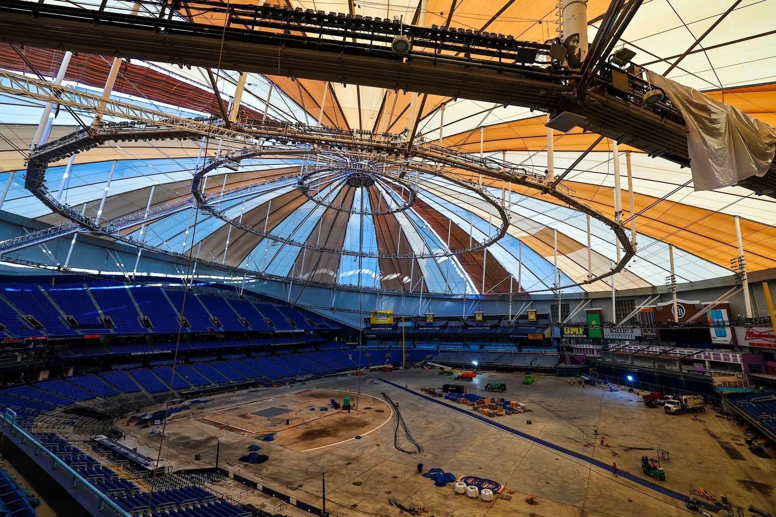 The interior of a stadium that is currently undergoing a domed roof replacement.