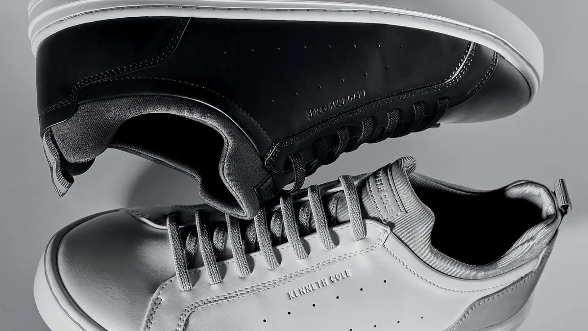 Two Kenneth Cole sneakers are photographed next to eachother.
