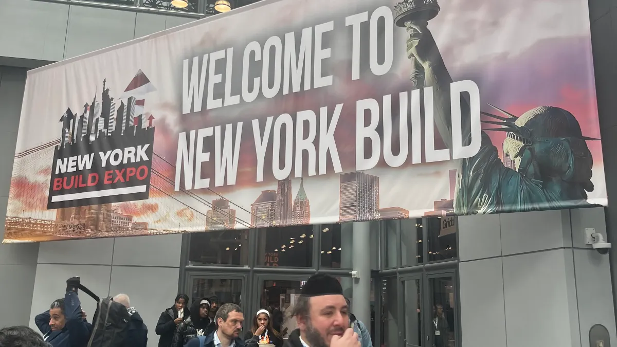 Attendees walk through the Javits Center