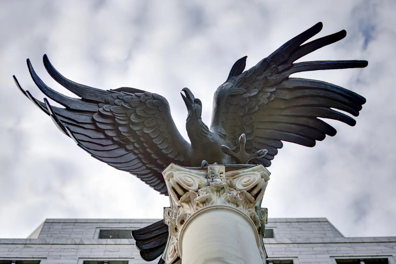 A bronze sculpture of an eagle with a 16-foot wingspan adorns the outside of the Federal Reserve Bank of Atlanta.