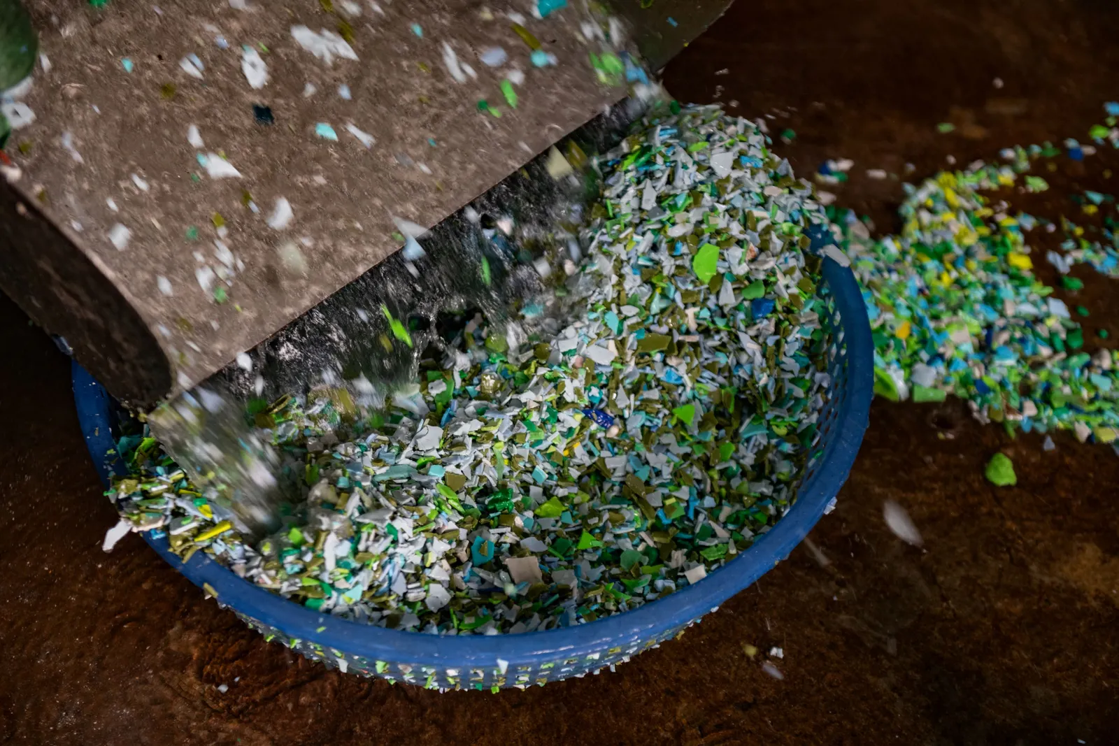 Plastic is shredded at a recycling workshop on November 17, 2025 at Xa Cau village, outside Hanoi, Vietnam.