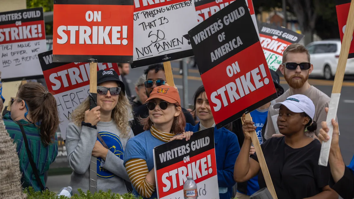 People picket outside of Paramount Pictures studios during the Hollywood writers strike on May 4, 2023 in Los Angeles, California.