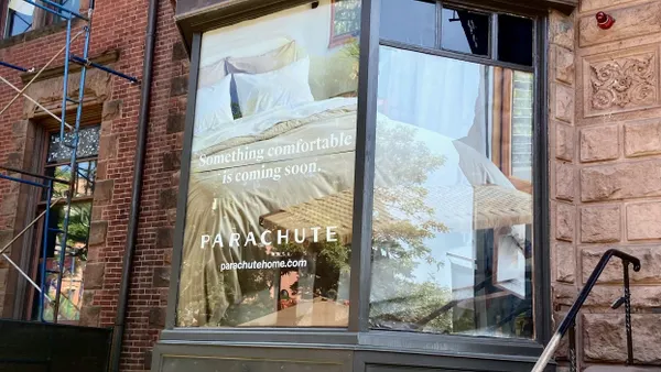 A bay window of a home goods shop.