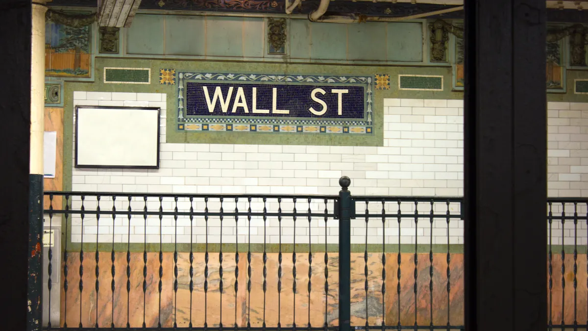 An empty Wall Street subway station