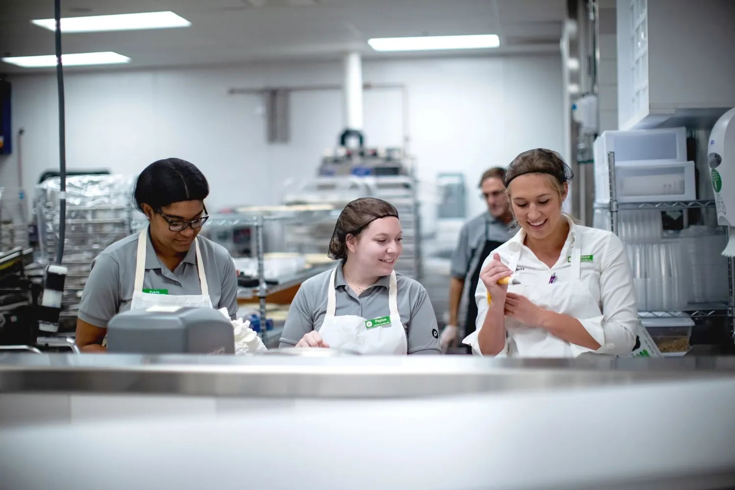Bakery workers at a grocery store.