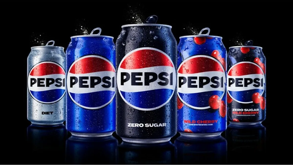 Five Pepsi cans