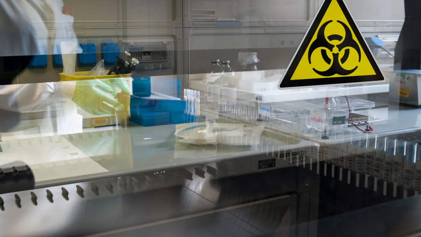 Research worker in a biohazard lab