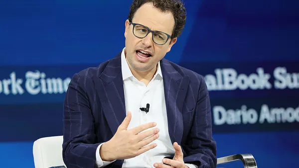 an image of executive Dario Amodei speaking