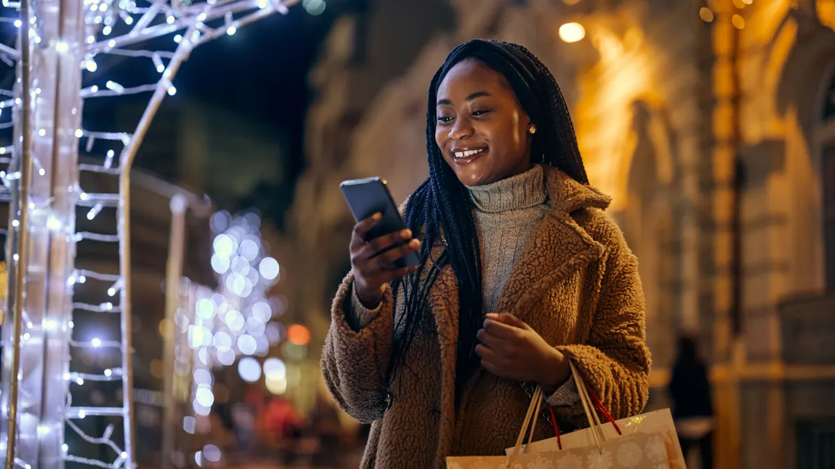 woman shopping on her phone