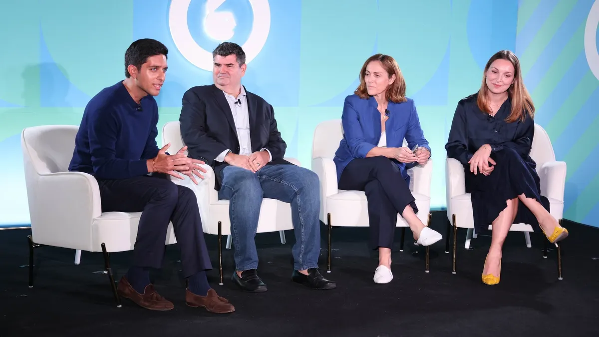 Executives sit in white chairs on stage at an Advertising Week New York panel. From left: Nikhil Lai, senior analyst at Forrester; Greg Johns, chief product officer and executive vice president, Canvas Worldwide; Marta Martinez, managing director Americas, Google marketing platform at Google; and Costanza Ghelfi, chief product officer at Making Science.