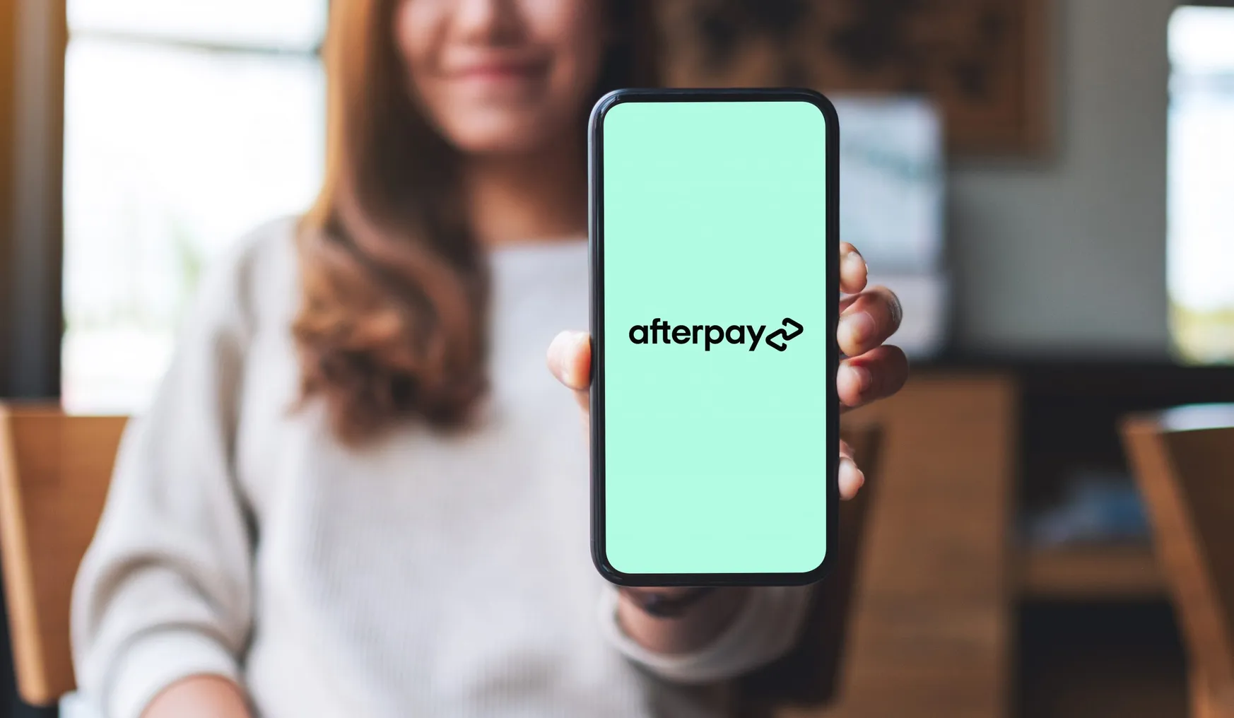 Afterpay logo on a phone screen