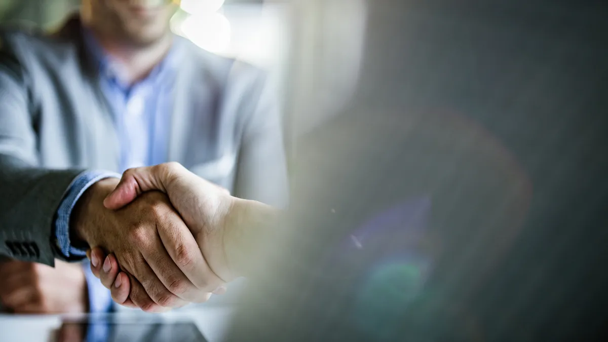 Close up of businessmen came to an agreement in the office