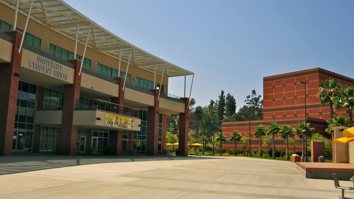 A wide shot of the Cal State LA campus, with a building in view that reads "university student union."