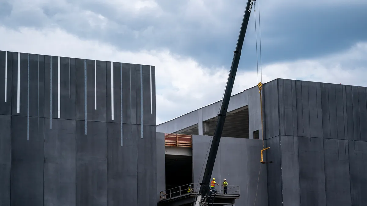 A construction crew works on a CloudHQ data center on July 17, 2024 in Ashburn, Virginia.