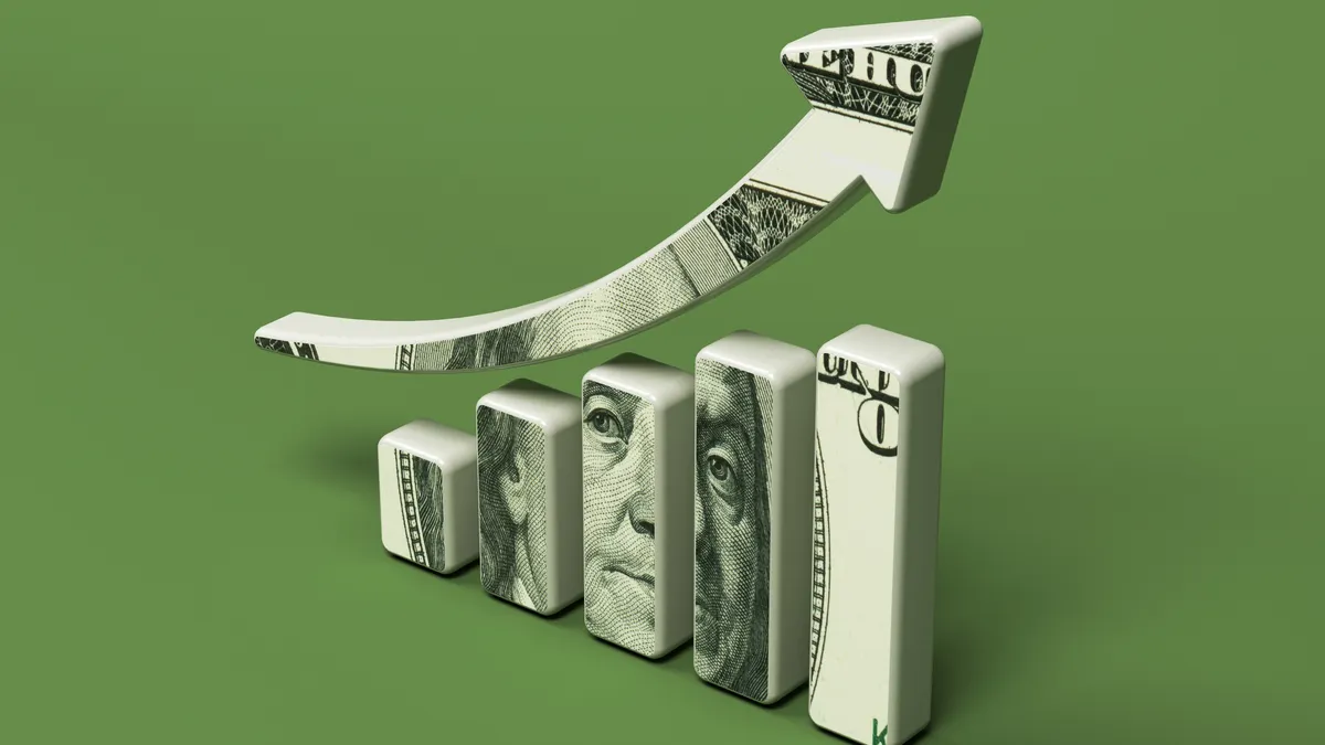 Financial chart and 100 dollar banknote. On a green-colored background.