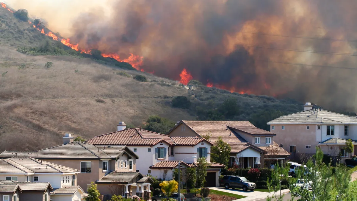 Southern California brush fire near houses