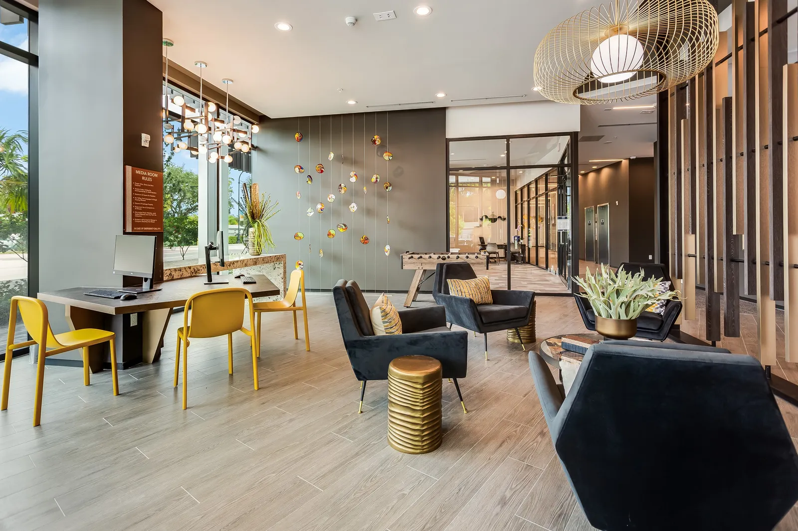 An apartment lobby with a large glass sculpture.