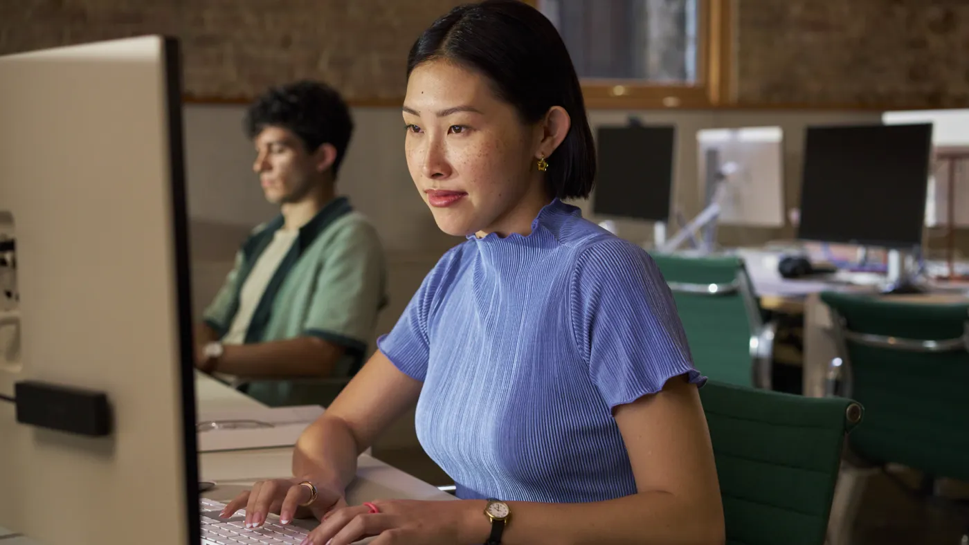 People working at laptop
