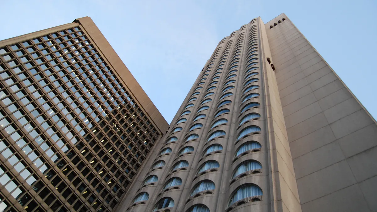 The exterior of hotel and office buildings.