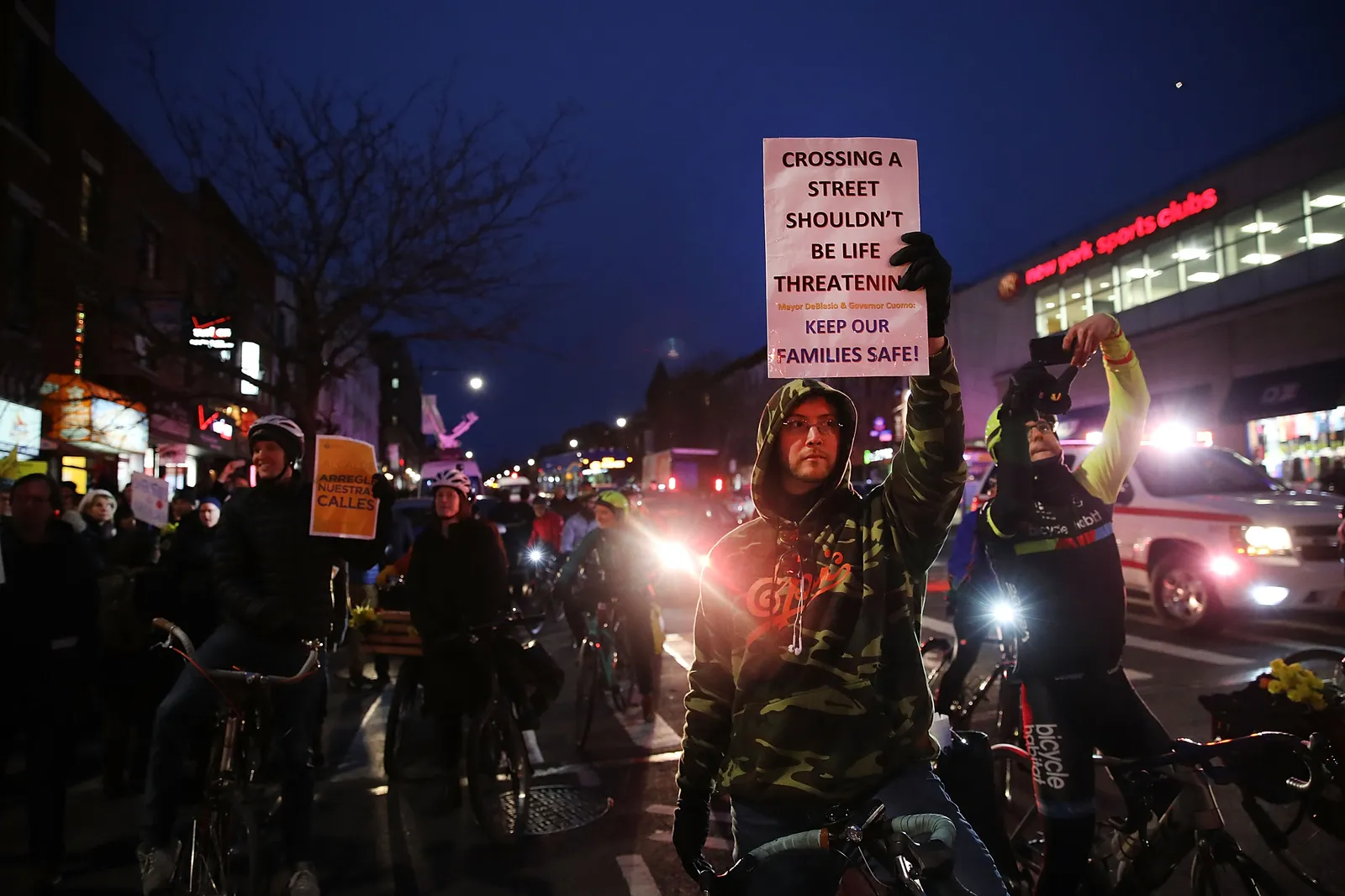 Many people at night protesting in favor of safer streets.