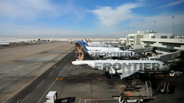 Multiple Frontier Airlines planes at Concourse A in Denver.