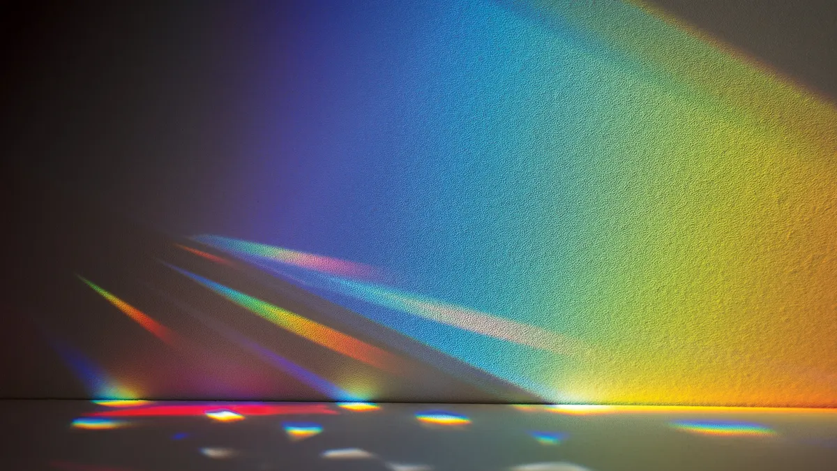 Rainbow background with disco light for products and overlays.