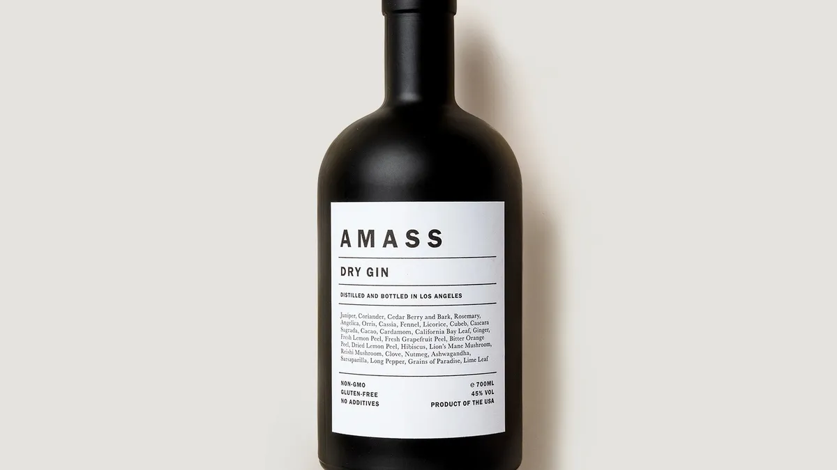 Black and white bottle saying Amass on it