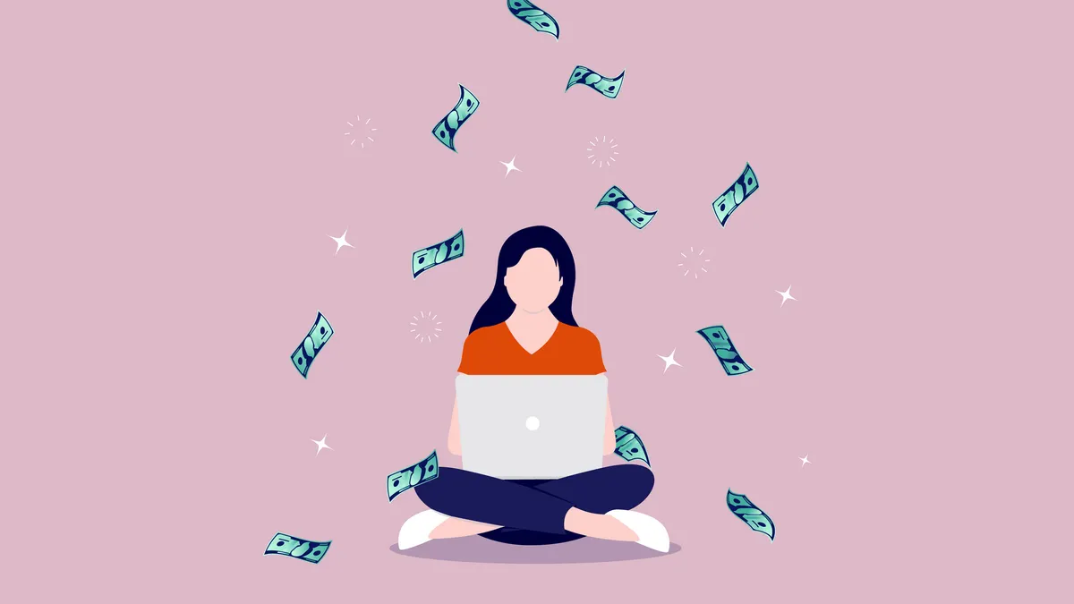 A woman sits cross legged in front of her laptop while dollar bills swirl in a semicircle behind her