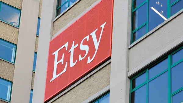 A giant building with giant letters with the name Etsy on it.