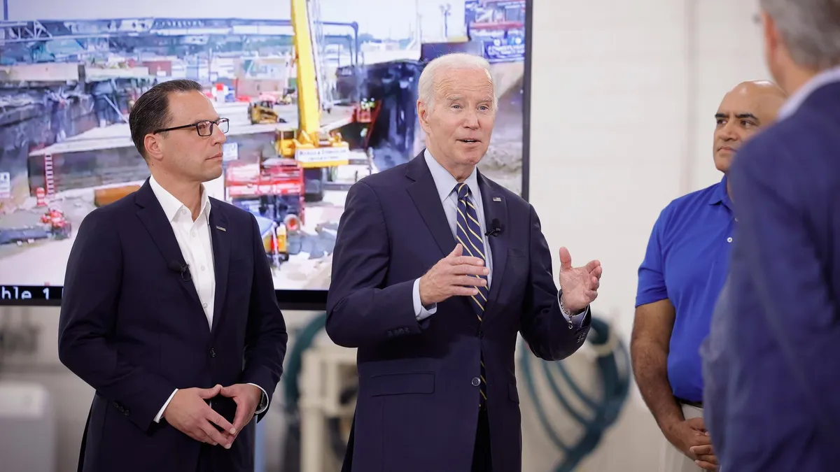 Pennsylvania Gov. Josh Shapiro and President Joe Biden speak with officials in Philadelphia about over the weekend.