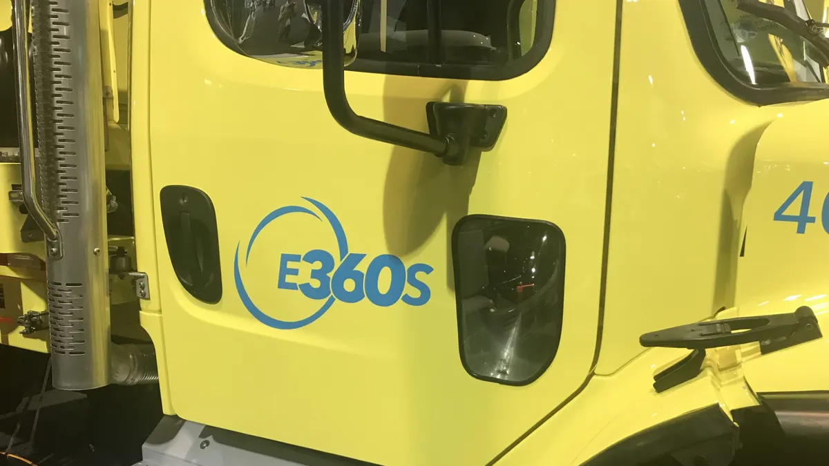 Closeup of the E360S logo on a waste collection truck