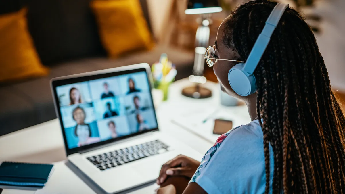 Group of unrecognisable international students having online meeting