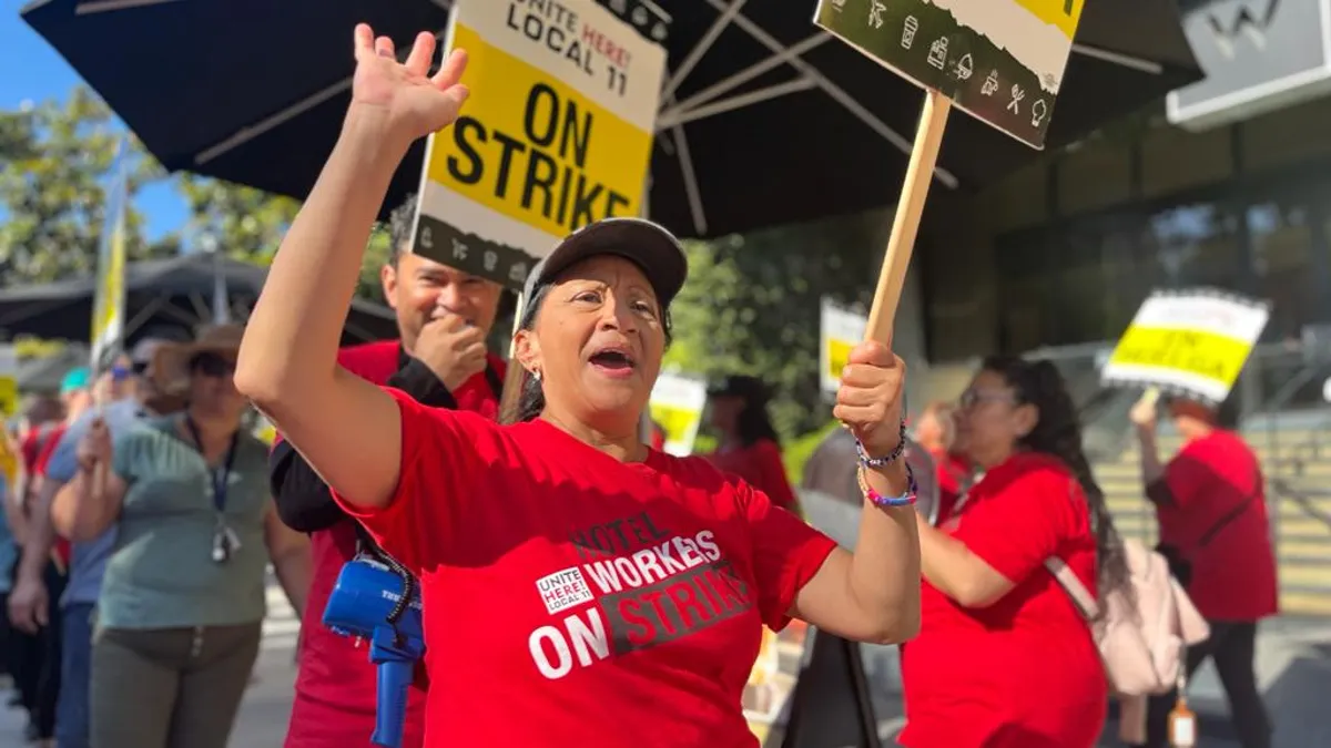 A photo of a striking hotel worker.