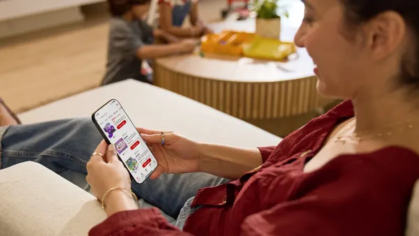 Woman shops from Target on a smartphone
