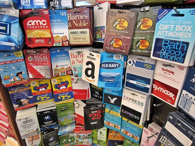 Different gift cards on sale at a store