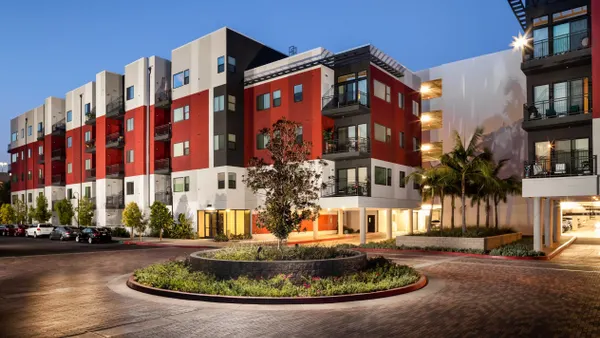 Picture of four-level brick apartment building