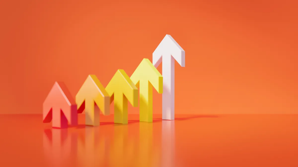 Colorful Arrows Over Orange Background