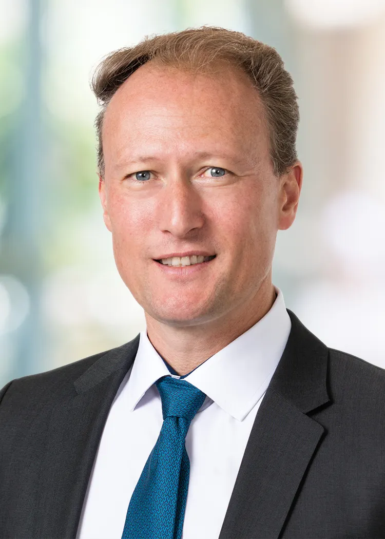 A headshot of Stout executive Steven Rathbone.