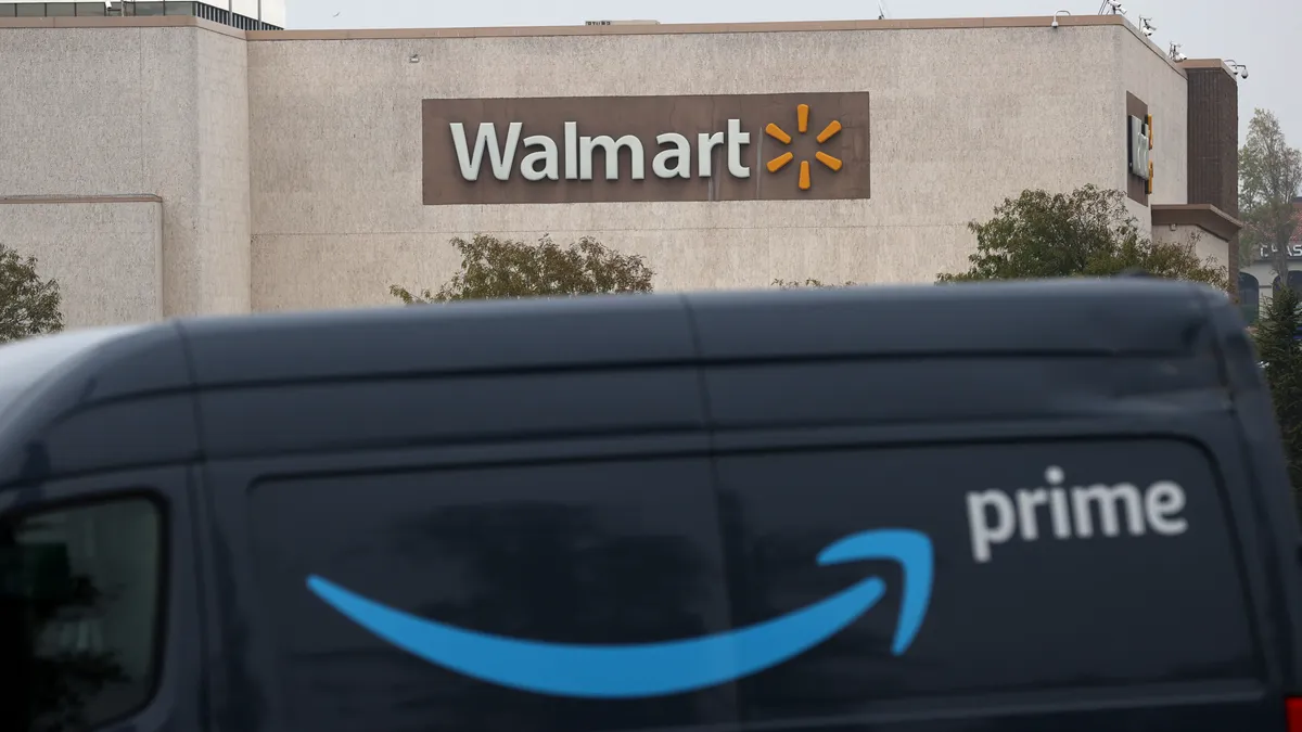 An Amazon Prime delivery van sits parked near a Walmart store on September 3, 2020 in Richmond, California.