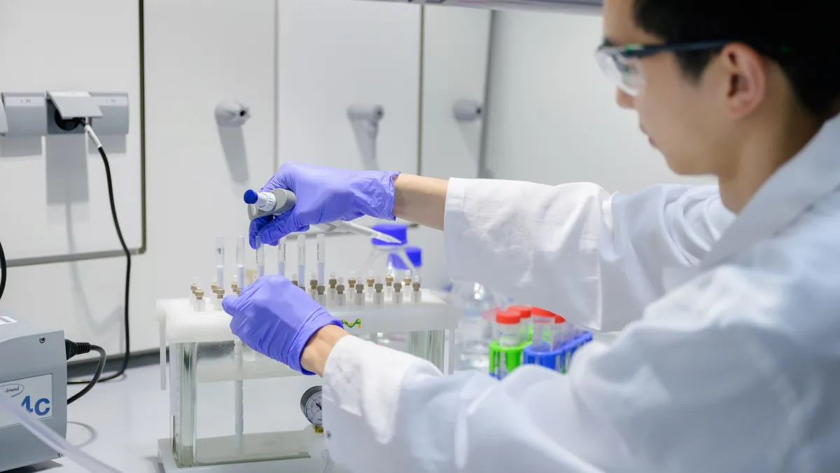 A scientist works in a laboratory at Airna.