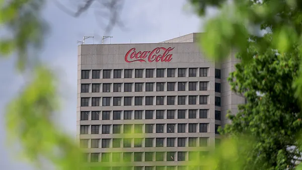 an exterior shot of coca cola headquarters on a sunny day