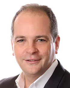 A headshot of ResMed CEO Mick Farrell.