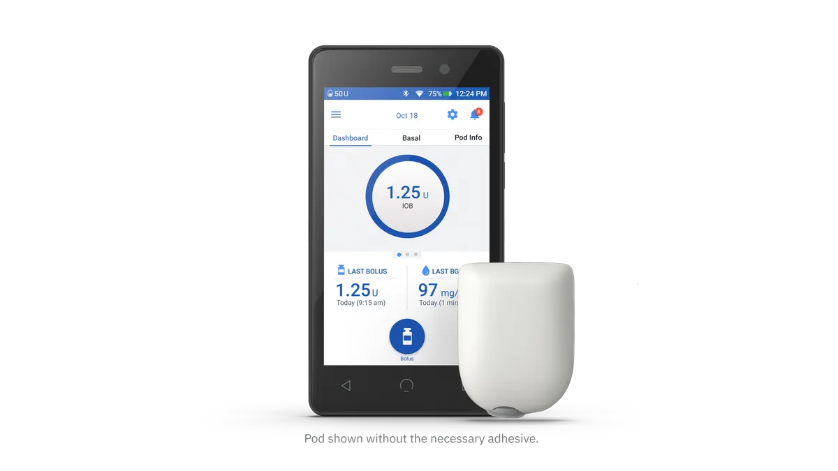 A phone-like device shows a bolus insulin measurement, with a white, U-shaped device to the right.