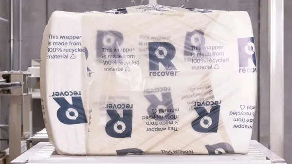 Recover's recycled cotton is on a factory conveyer belt.