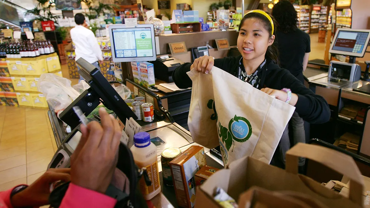 Grocery worker at checkout