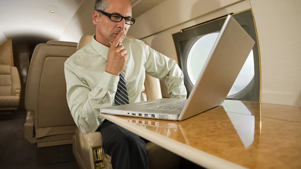 Businessman on a private plane