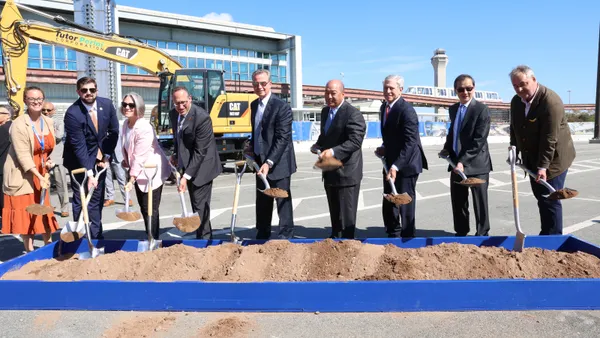 Project stakeholders hold a groundbreaking ceremony