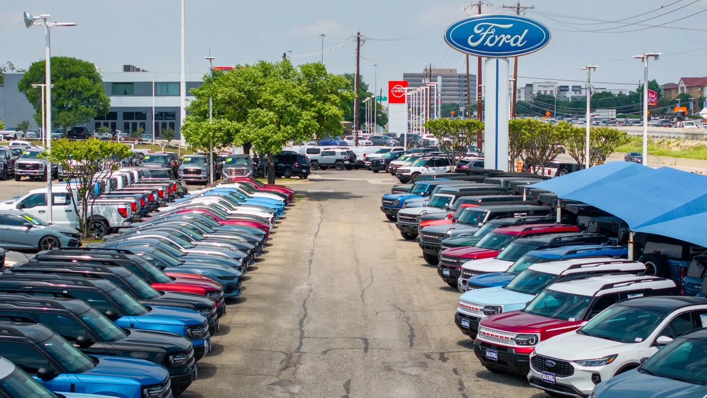 Ford vehicles sit on a dealership lot in Austin, Texas, on April 18, 2025.