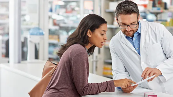 Customer, service and medicine prescription at pharmacy with help from healthcare expert at store counter.