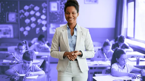 Woman standing in a classroom